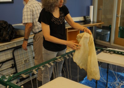 Rabbi Linda Motzkin making parchment
